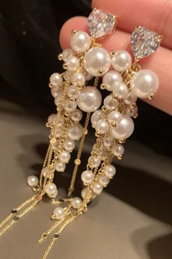 Brincos de gota longa pérola dourada