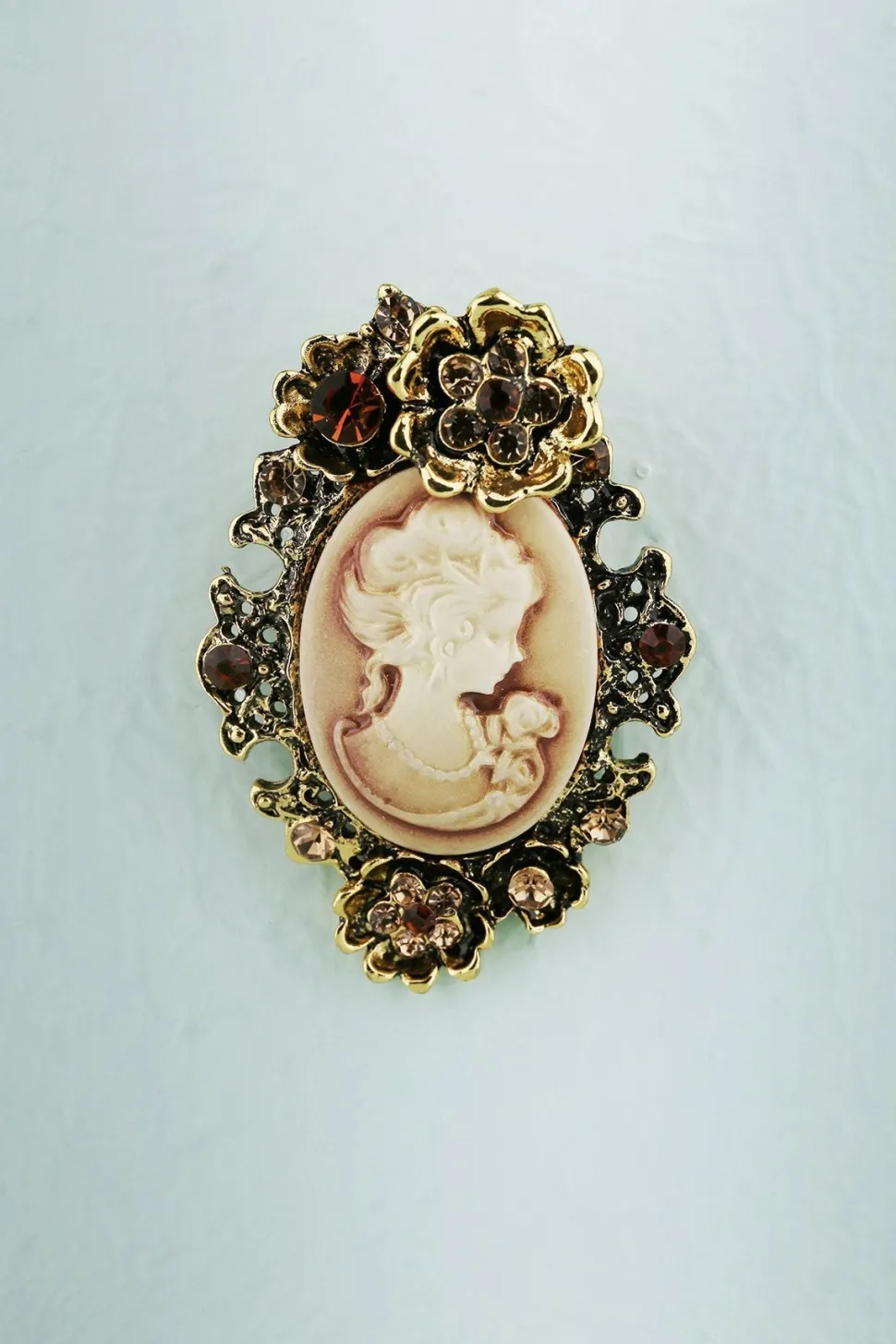 Broche de beleza de strass