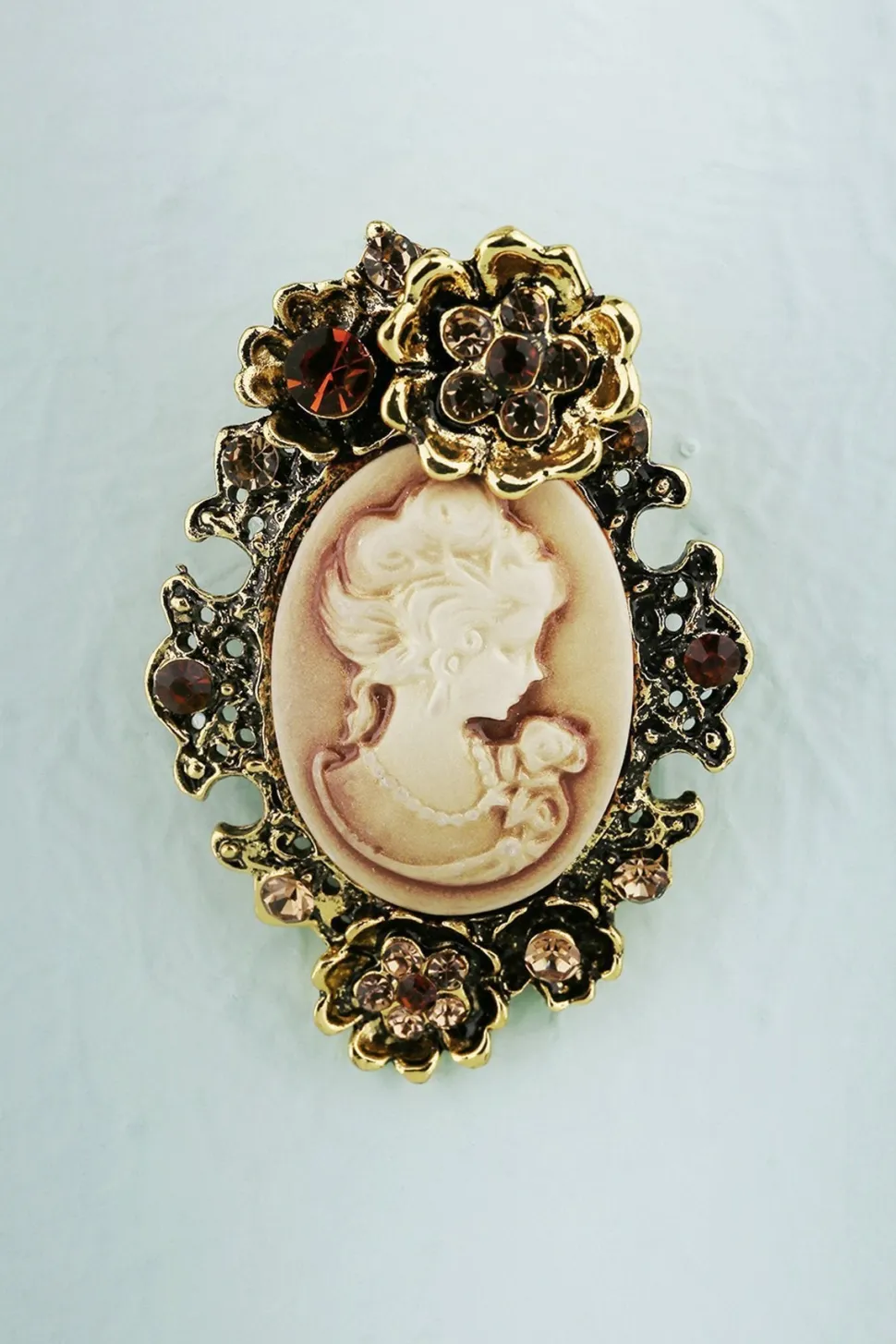 Broche de beleza de strass
