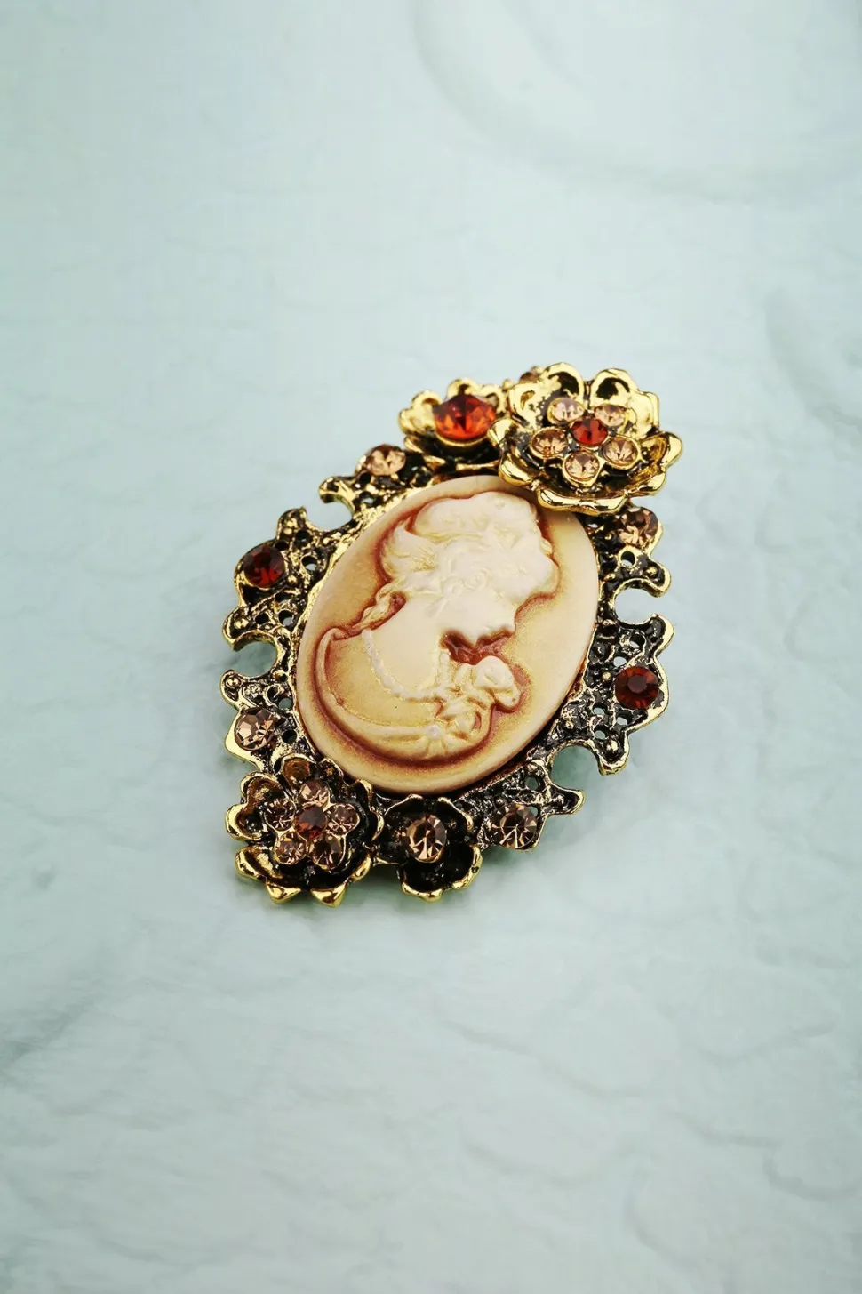 Broche de beleza de strass