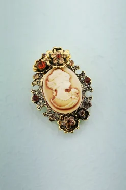 Broche de beleza de strass