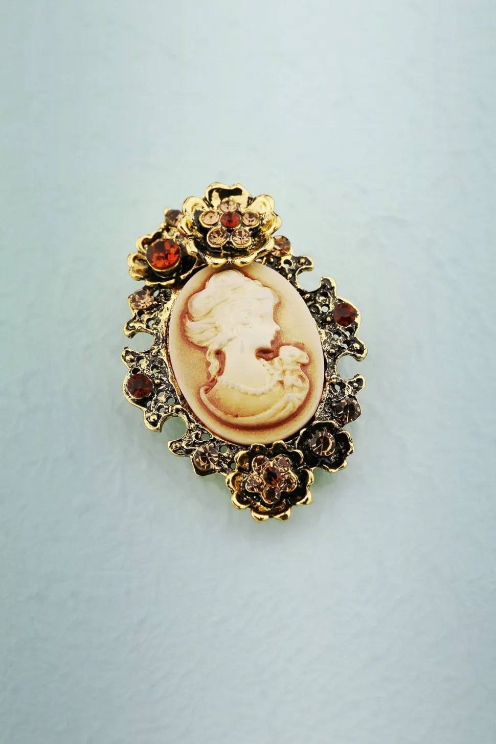 Broche de beleza de strass