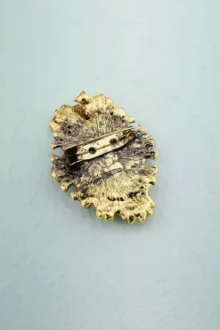 Broche de beleza de strass