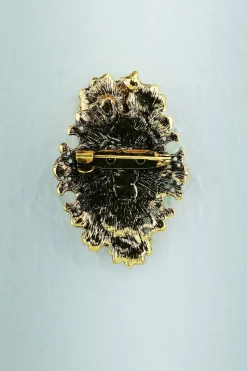 Broche de beleza de strass