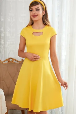 Buraco amarelo do vestido redondo do pescoço vintage