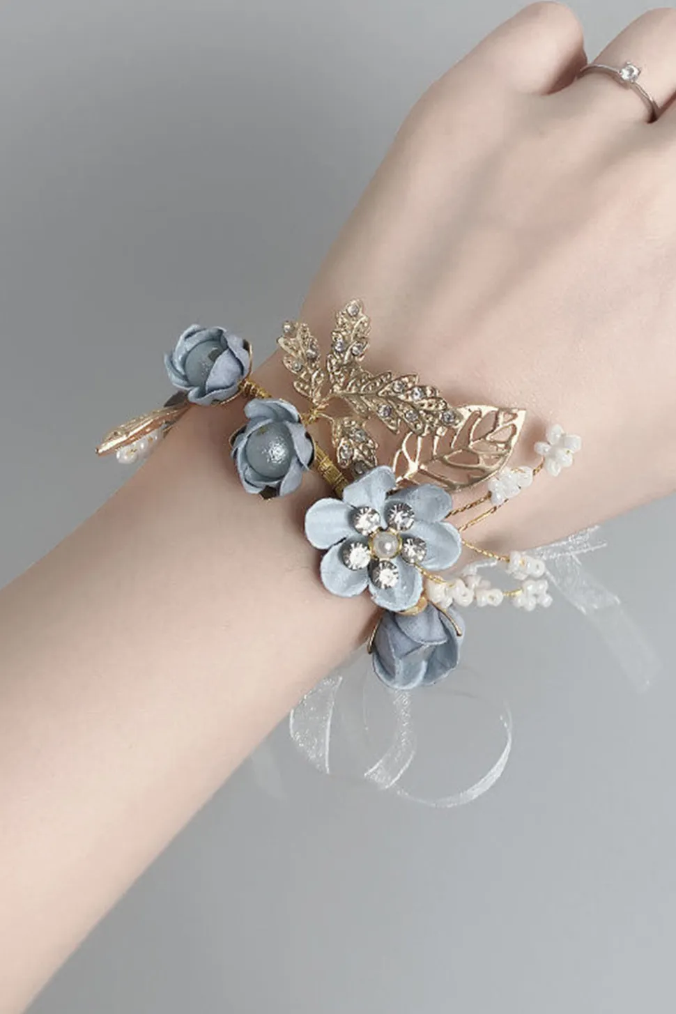 Corsage de pulso azul sofisticado com strass