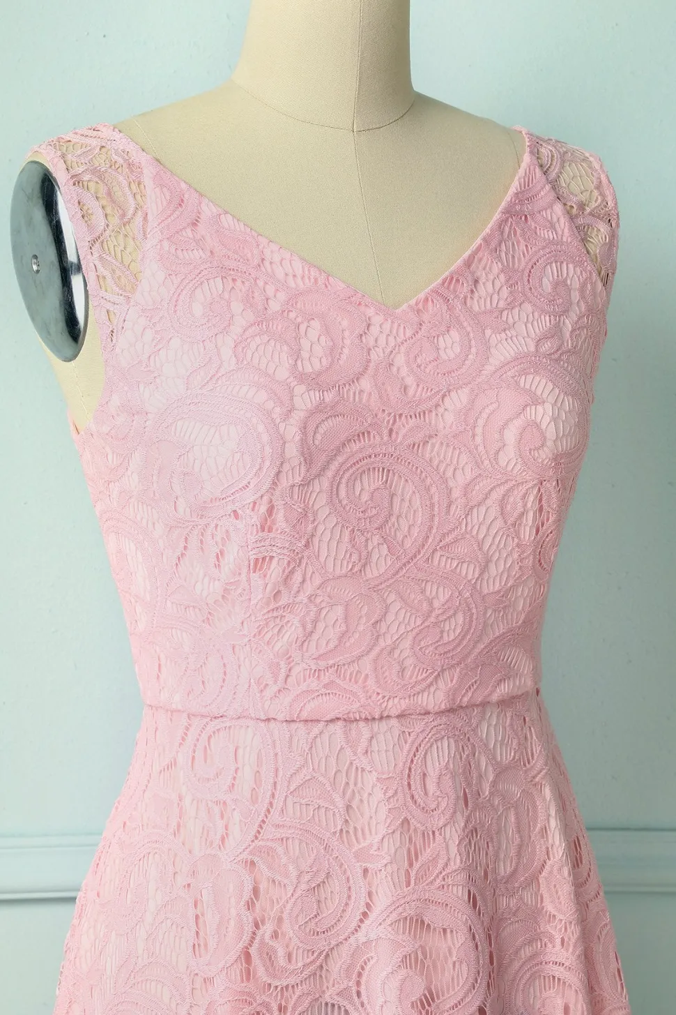 Dama de honra rosa do laço