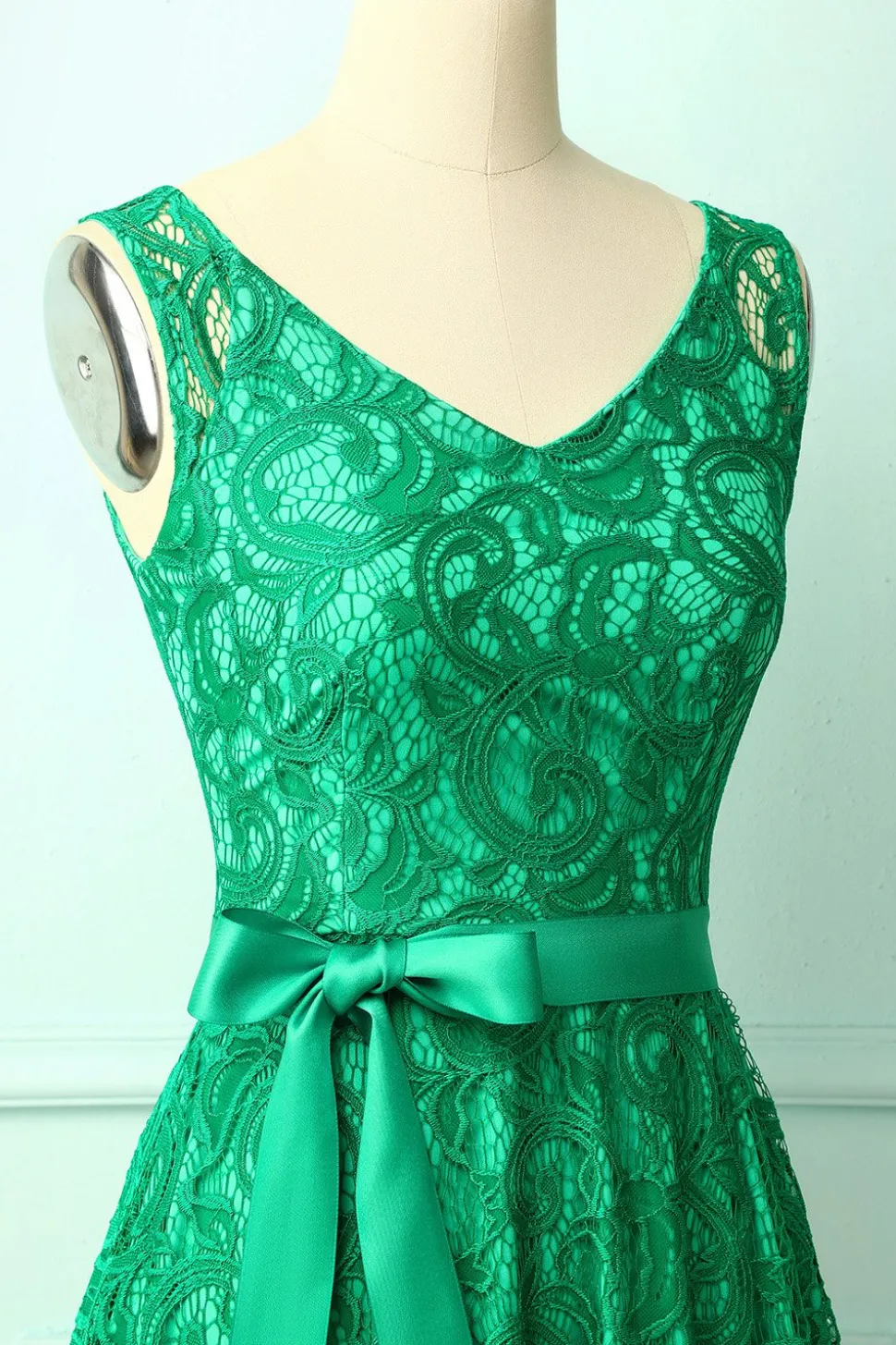Dama de honra verde do laço