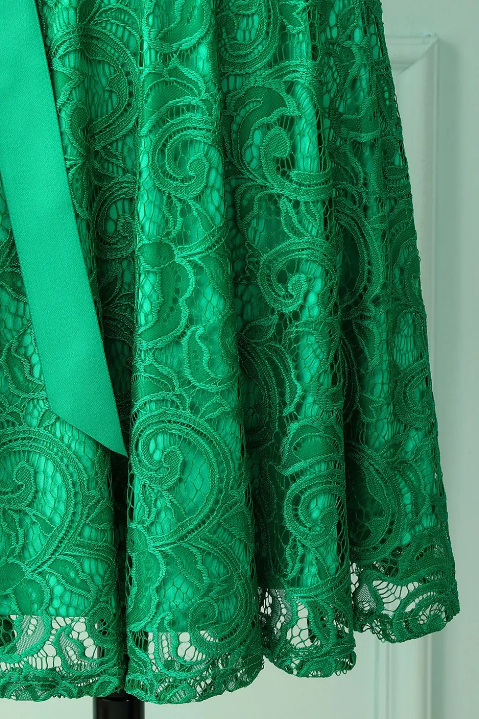 Dama de honra verde do laço