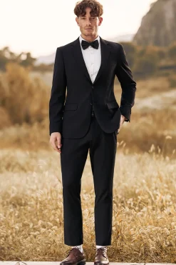Lapela preta entalada dois botões ternos de casamento masculinos