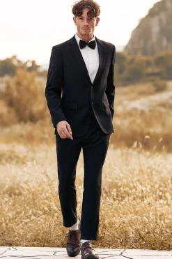 Lapela preta entalada dois botões ternos de casamento masculinos