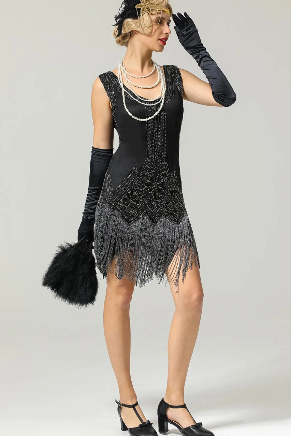 Preto vestido de flapper de lantejoulas dos anos 1920