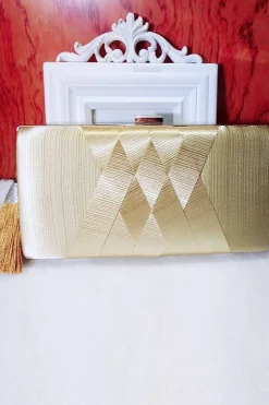 Saco de embreagem de noite glitter dourado com borla