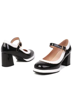 Sapatos pretos do toe round com correia ajustável
