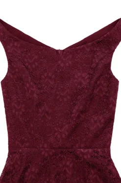 Um vestido de cocktail verde escuro bateau line