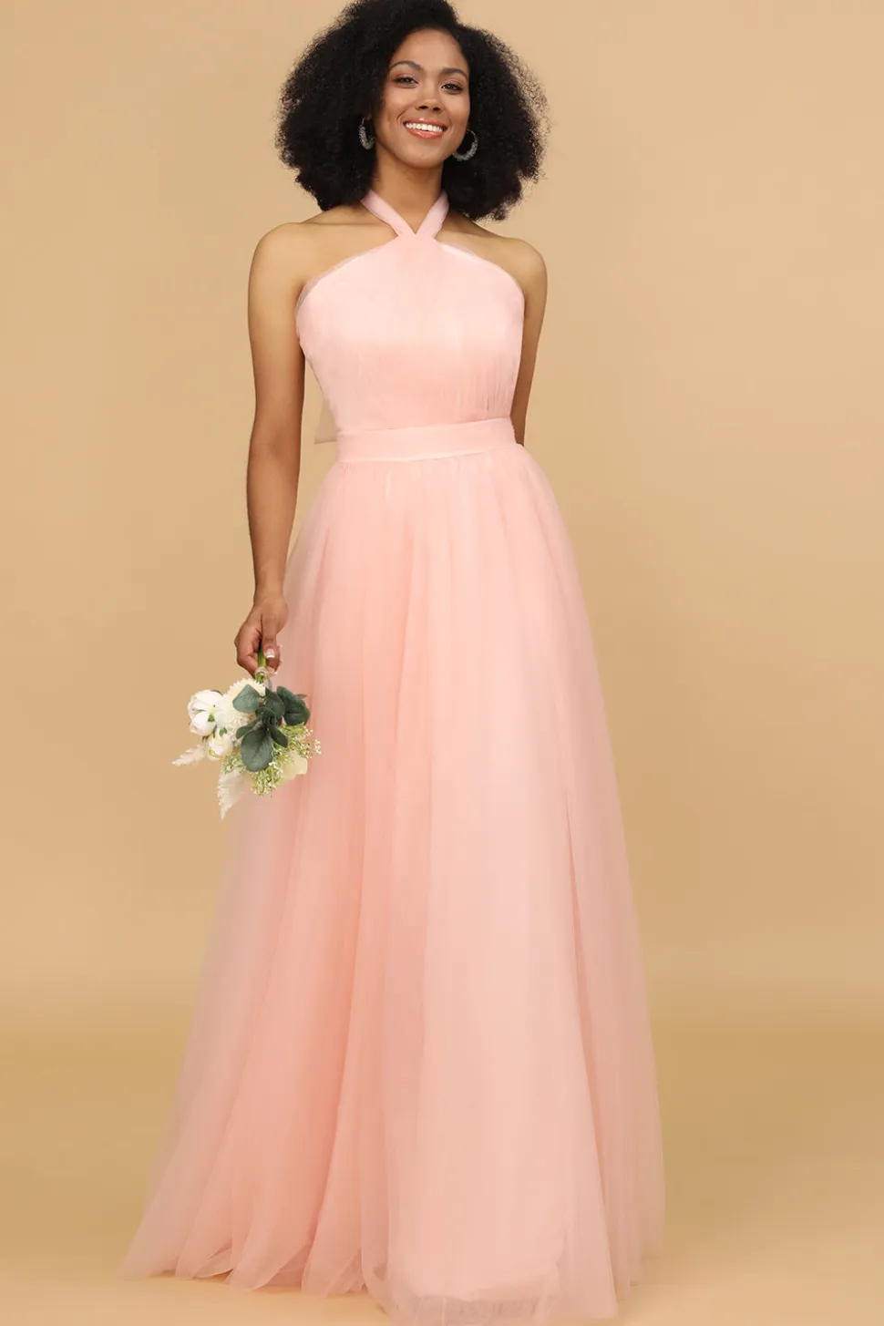 Um vestido de dama de honra blush de linha