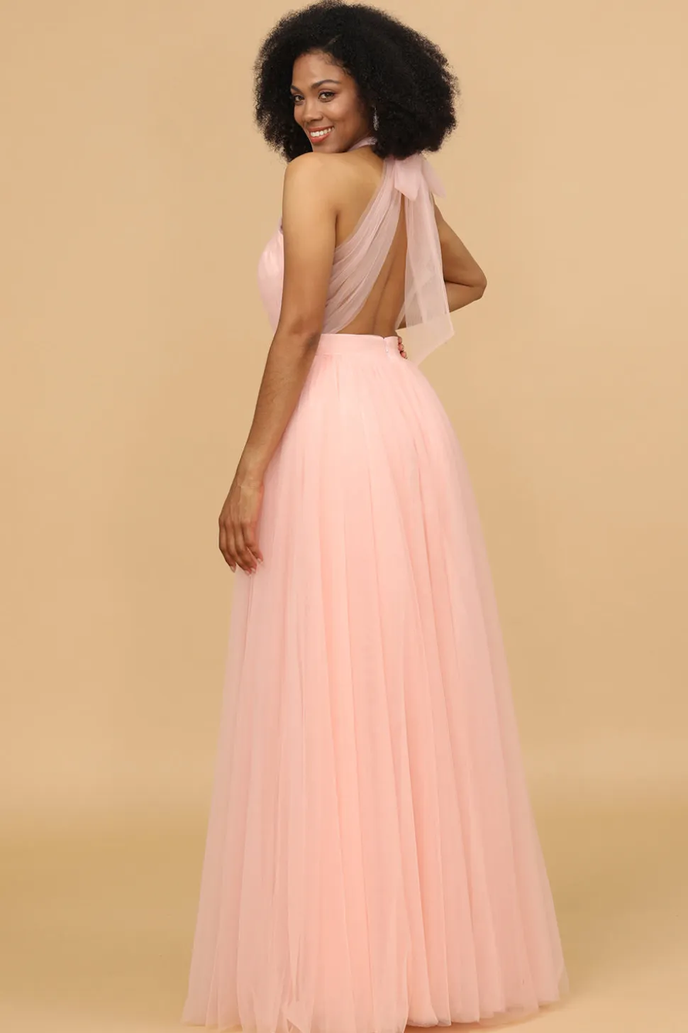 Um vestido de dama de honra blush de linha