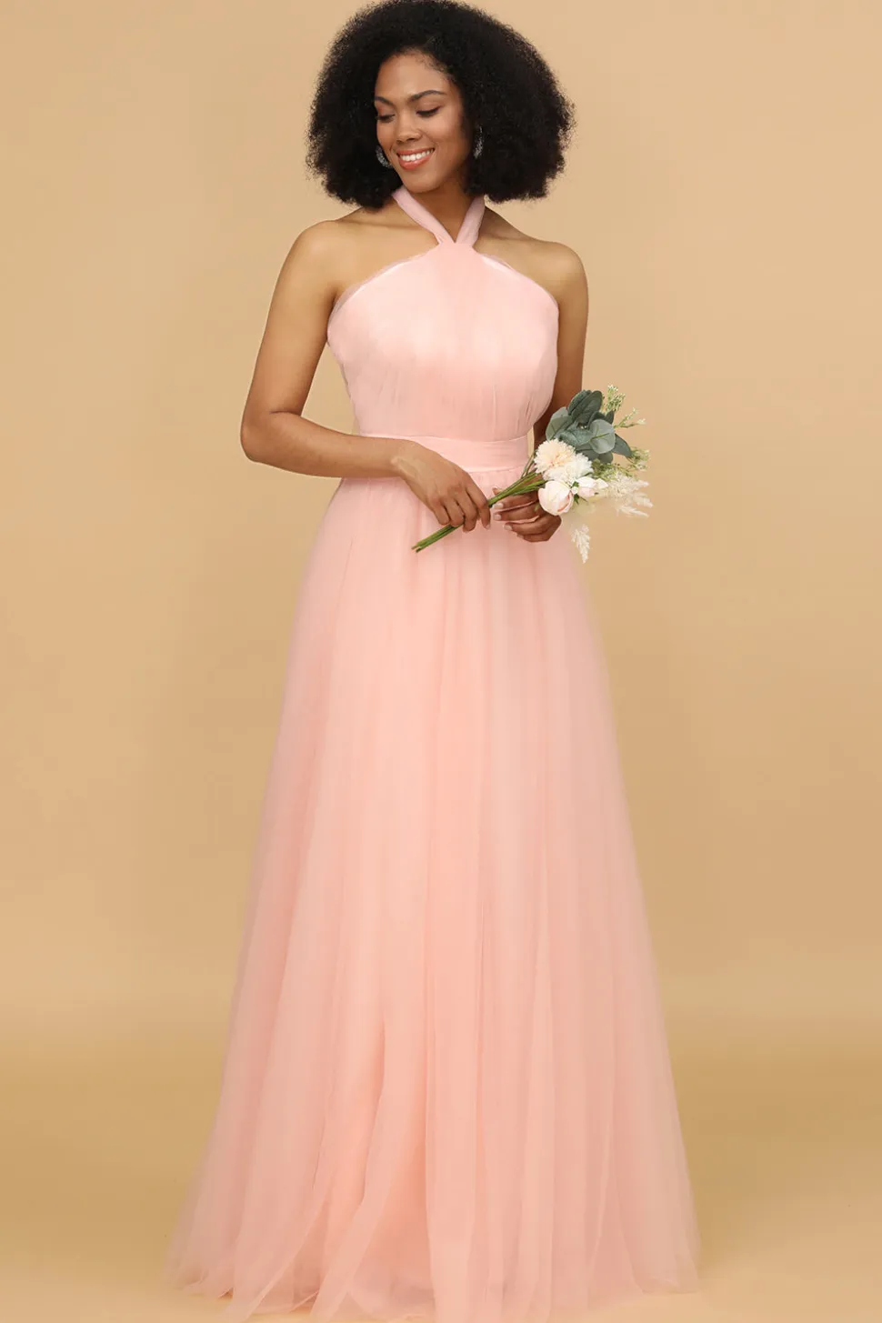 Um vestido de dama de honra blush de linha