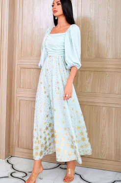 Um vestido de mãe verde claro de pescoço quadrado quadrado