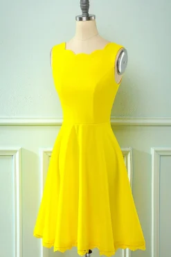 Vestido amarelo vintage de 1950 com renda oca