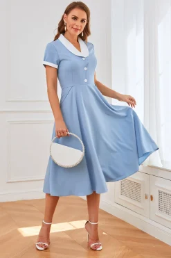 Vestido azul de balanço dos anos 50 com bolsos