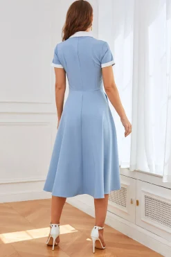 Vestido azul de balanço dos anos 50 com bolsos