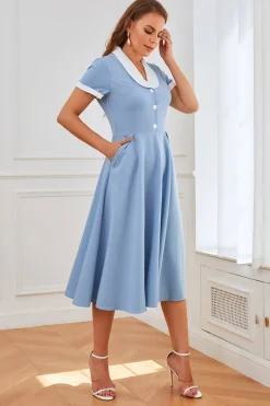 Vestido azul de balanço dos anos 50 com bolsos