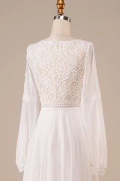 Vestido de noiva de marfim de mangas compridas com renda