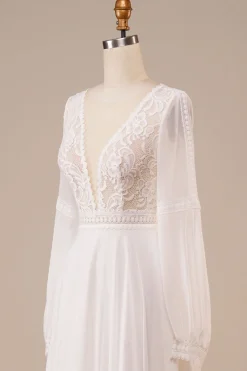 Vestido de noiva de marfim de mangas compridas com renda