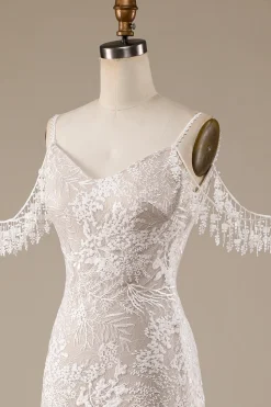 Vestido de noiva de renda de marfim com franjas