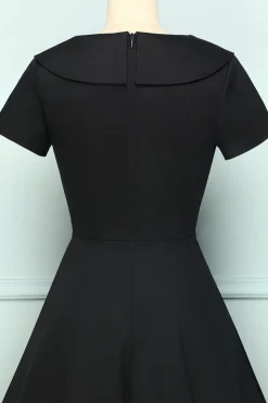 Vestido preto com botão