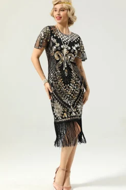 Vestido preto e dourado de 1920 com mangas de batwing