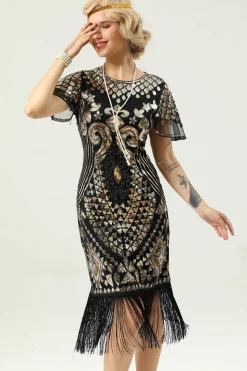 Vestido preto e dourado de 1920 com mangas de batwing