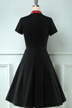 Vestido preto plaid swing 1950s