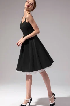 Vestido preto vintage com botão