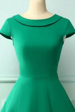 Vestido verde dos anos 50 do pescoço do barco
