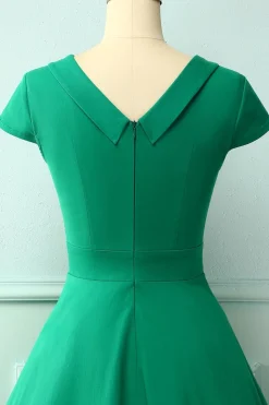 Vestido verde dos anos 50 do pescoço do barco