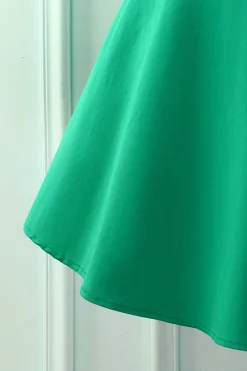 Vestido verde dos anos 50 do pescoço do barco
