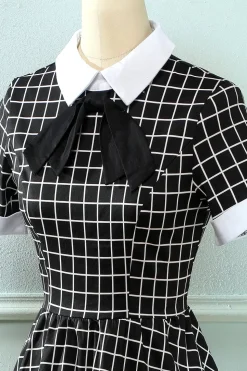 Vestido vintage xadrez de 1950 com arco